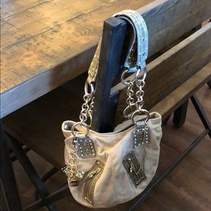 Tan suede Kathy Van Zeeland purse with gold accent
